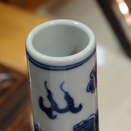 322 - A Chinese blue and white porcelain dragon design narrow-neck vase, 4 character mark, height 26cm