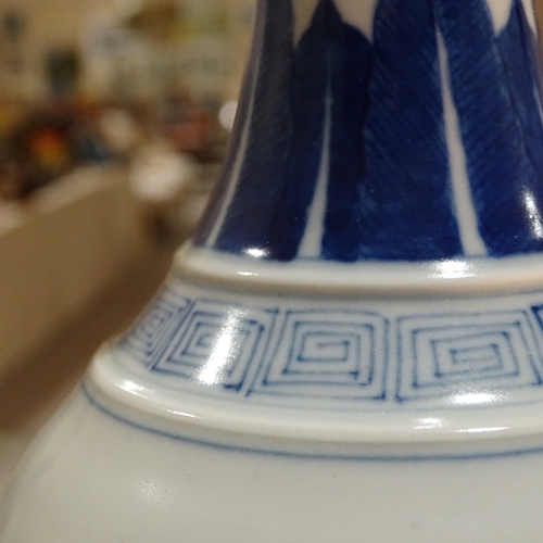 325 - A Chinese blue and white porcelain vase, with painted court scenes, height 25cm