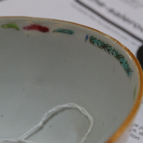 84 - A Chinese 18th century porcelain bowl with painted enamel flowers, diameter 11cm