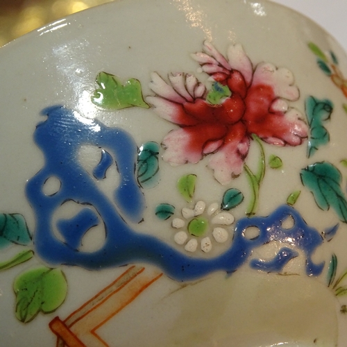 84 - A Chinese 18th century porcelain bowl with painted enamel flowers, diameter 11cm