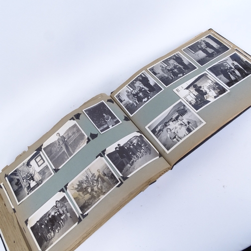 27 - An early 20th century photograph album, various travel  around the world, circa 1920s/30s, with some... 