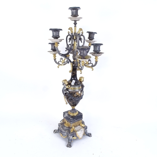 48 - A modern Empire style 7-light table candelabra, simulated marble urn with allover silvered and gilde... 