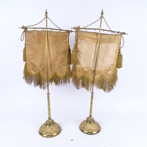 57 - A pair of 19th century Berlin beadwork face screens, mounted on original gilt-brass stands on relief... 