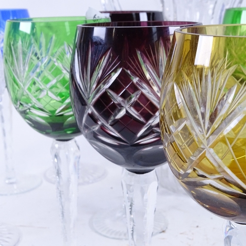 69 - A set of 7 harlequin hock glasses, 5 Tudor claret glasses, and a heavy cut-glass jug