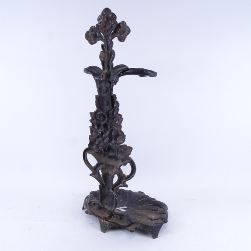 75 - An early 20th century black painted cast-iron stick stand, height 63cm