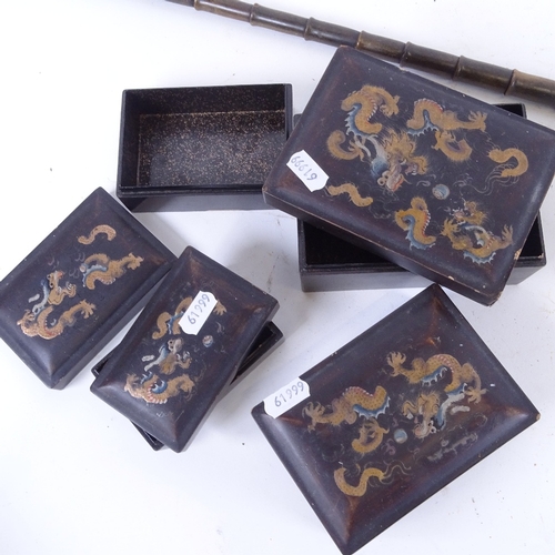 79 - A graduated set of 4 Chinese gilded and lacquered papier mache boxes, a resin jewel box, and a horn ... 