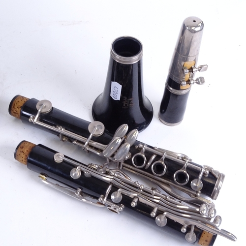 81 - A Vintage black lacquered Boosey & Hawkes 4-section clarinet, overall length 68cm, in fitted hardshe... 