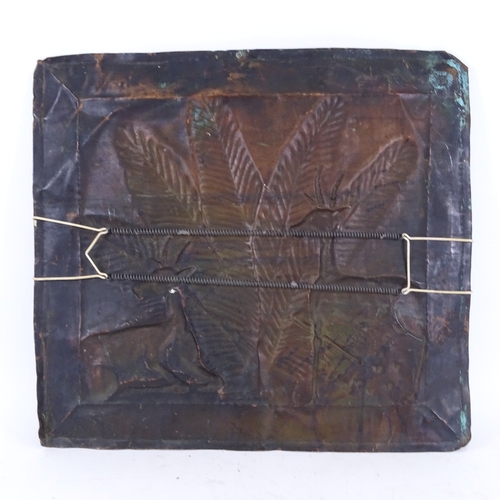 88 - A Zimbabwean relief embossed copper plaque, depicting Mutete tree and boks, 44cm x 48cm