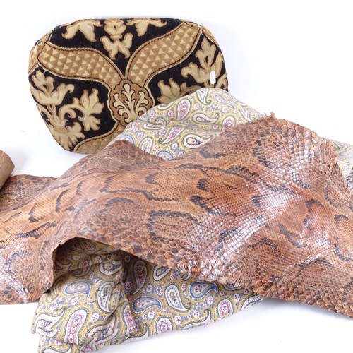 120 - Paisley bed cover, roll of snakeskin, and a foot cushion (3)