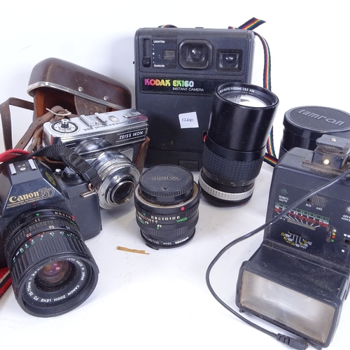 121 - Various Vintage cameras and equipment, including Canon T50, Zeiss Ikon etc (boxful)