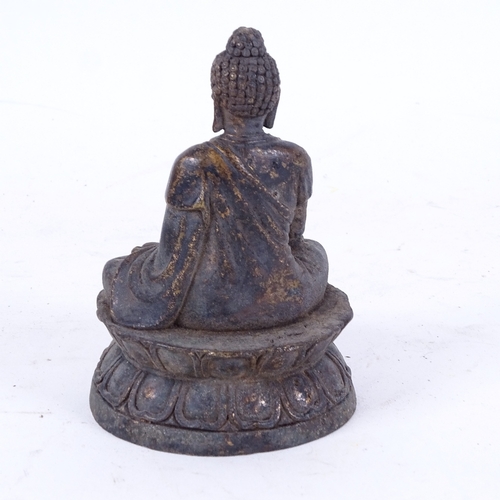 129 - A small Chinese bronze seated Buddha, on double-lotus base, height 11cm