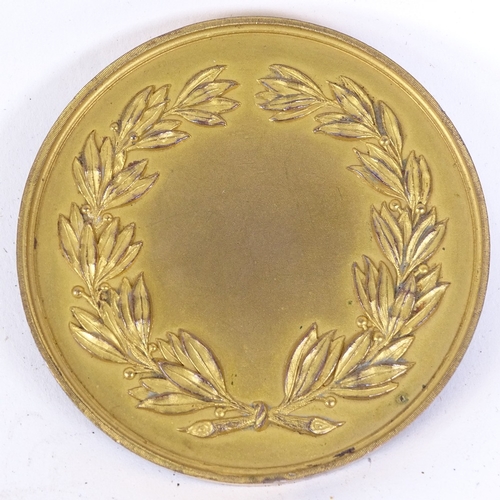 144 - A 19th century gilt-bronze Beaconsfield medal, by J W Minton, diameter 6.5cm