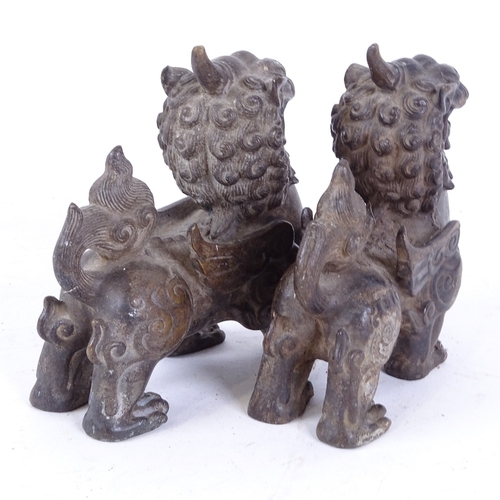 145 - A pair of Chinese polished bronze Dogs of Fo, length 12cm