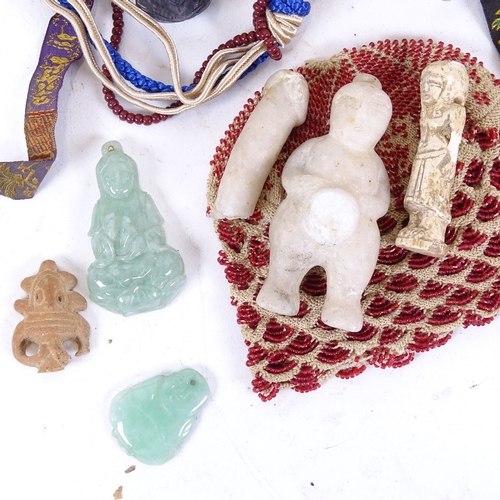 148 - Various collectables, including carved stone fertility figure, jadeite items, embroidered silk tasse... 