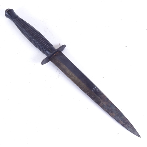 166 - A Fairbairn Sykes British Commando Third pattern fighting knife, blackened forged steel blade with r... 