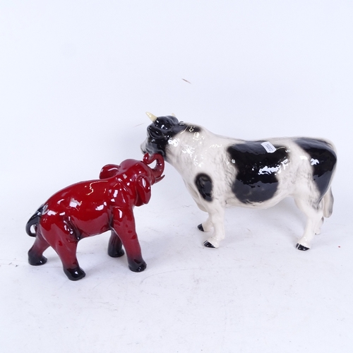 179 - A Royal Doulton Flambe elephant, and a Melba Ware bull, largest length 30cm (2)