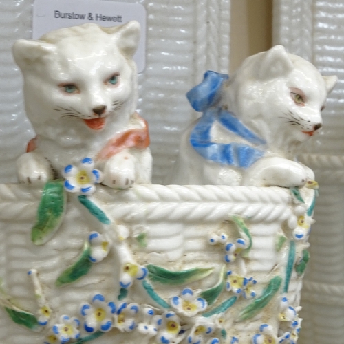 214 - A pair of Victorian glazed ceramic kitten wall pockets, by W T Goode of London, height 21cm