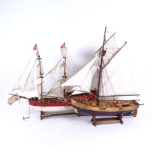 252 - A group of 2 handmade model ships on stands, length 49cm, height 46cm