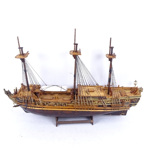 257 - A handmade model of a 3-masted 19th century merchant ship, on stand, length 66cm, height 46cm