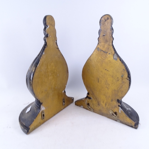 327 - A modern pair of painted and gilded wall brackets, height 40cm