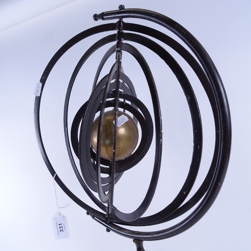 331 - A Vintage modernist celestial wrought-iron and brass armillary sphere, on folding tripod base, heigh... 