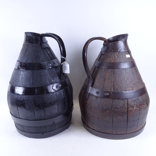 332 - A large graduated pair of coopered oak Cider flagons, largest height 44cm