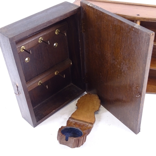 352 - A lead covered oak hanging key safe, carved wood pocket watch holder, and a housemaid's cutlery tray... 