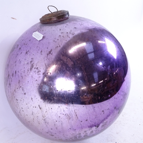 354 - A purple lustre witch's ball, diameter 25cm