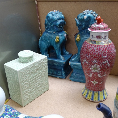 429 - A pair of Chinese blue glaze Dogs of Fo, armorial brush pot, celadon glaze tea caddy etc