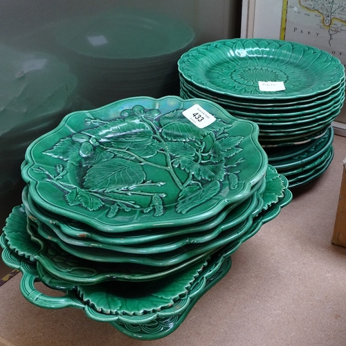 433 - A large quantity of Wedgwood Majolica green glaze leaf and flower plates etc