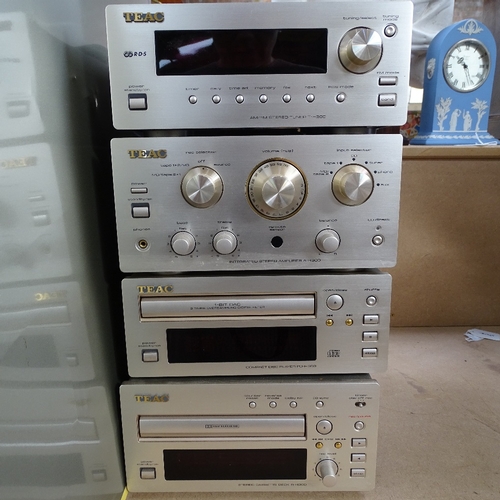 445 - A TEAC 500 4-section stacking Hi-Fi system, comprising AM/FM tuner, 50 watt amplifier, CD player, an... 