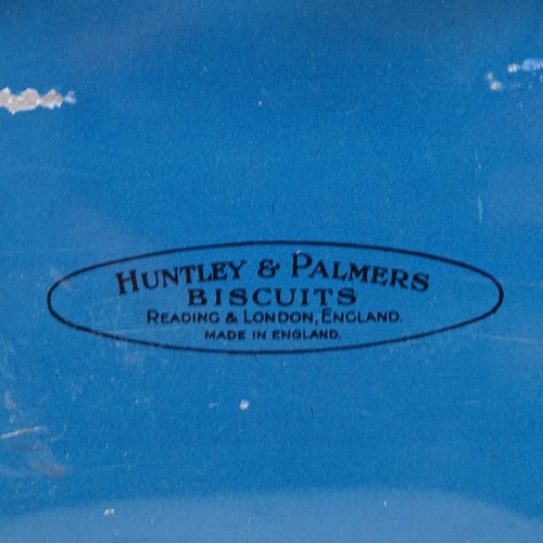 474 - An early 20th century Huntley & Palmers pram biscuit tin, circa 1930, lithographed tin panels with r... 