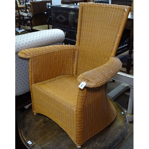 1355 - A contemporary Arts and Crafts style rattan armchair