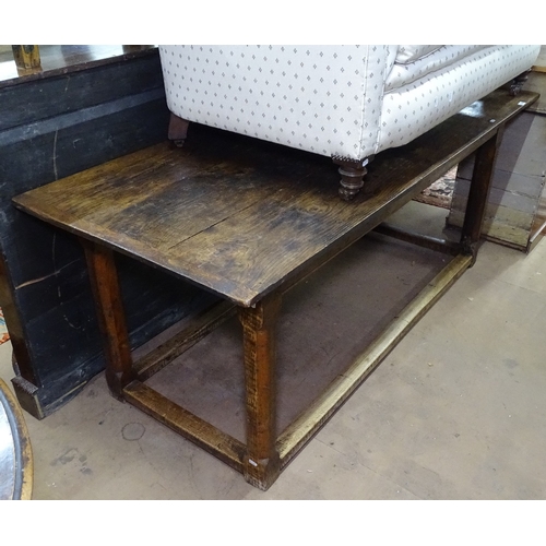 1365 - An Antique oak plank-top rectangular dining table, raised on canted legs and flat stretchers, L183cm... 