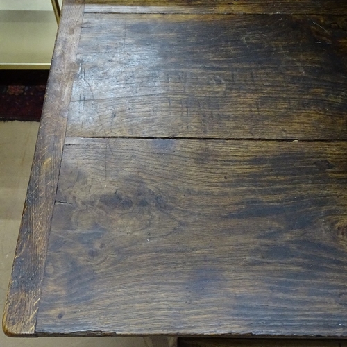 1365 - An Antique oak plank-top rectangular dining table, raised on canted legs and flat stretchers, L183cm... 