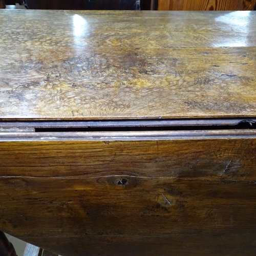 1372 - A large Antique oak gateleg table, with double-end frieze drawer, L115cm