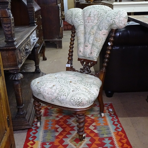 1396 - A Victorian upholstered nursing chair, with Prince of Wales design back on barley twist legs