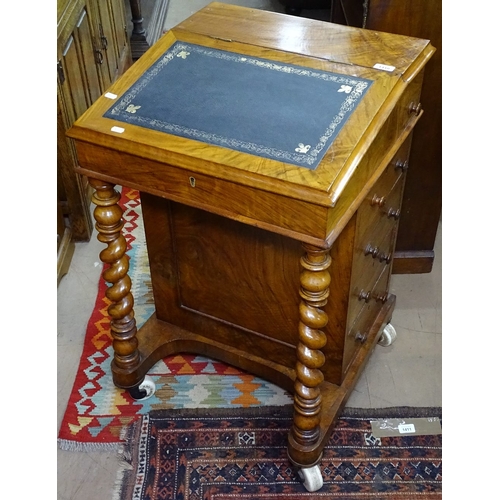 1410 - A Victorian walnut Davenport, W54cm