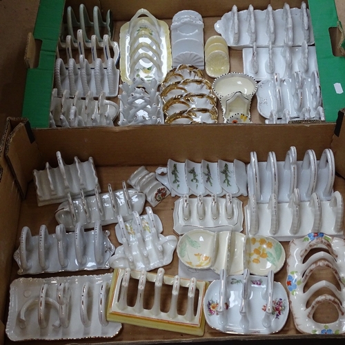 496 - A large quantity of porcelain toast racks, including Burleigh Ware etc (approx 30)