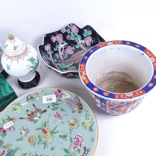 558 - A Cantonese plate with butterfly and floral decoration, 26cm, a pair of Dresden jars and covers on s... 