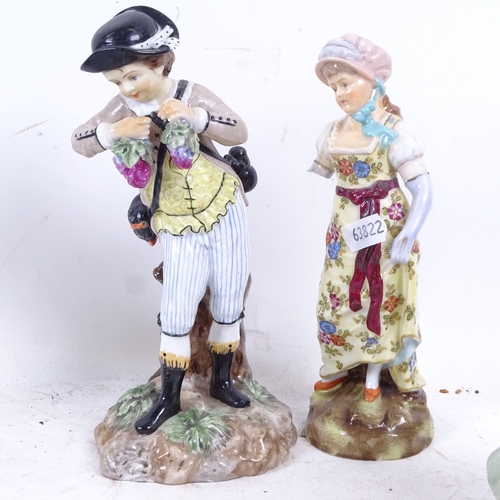 561 - A pair of German figures with grapes and flowers, 20cm, a Bocage figure etc