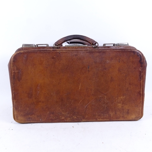 582 - An Antique leather Gladstone bag, length 44cm