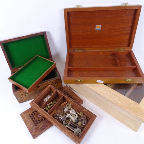 613 - A marquetry-banded box with tray-fitted interior, 20cm across, 3 other boxes, and various clock keys