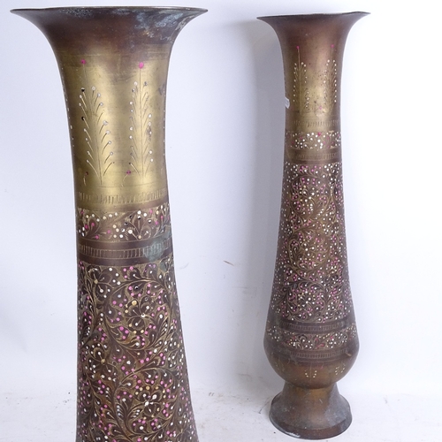 632 - A pair of enamelled Eastern brass vases, 58cm, and a large magnifying glass