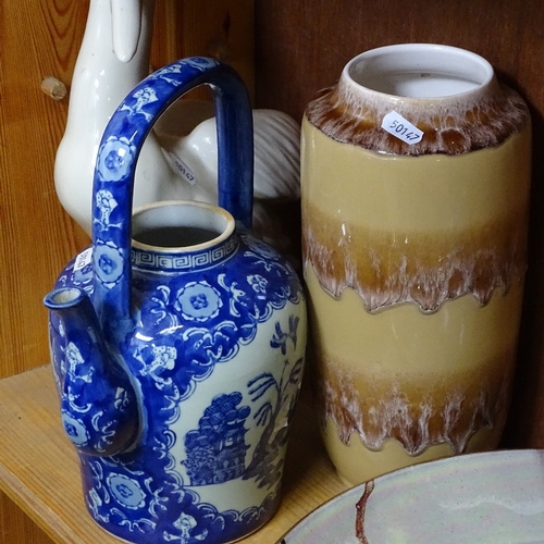 687 - A ceramic pelican, 35.5cm, and Oriental tea kettle, a Continental vase, and a Butley Pottery dish