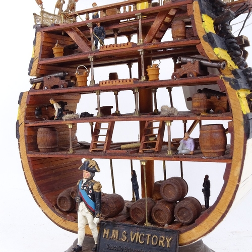 226 - A handmade cross-section of HMS Victory, height 73cm