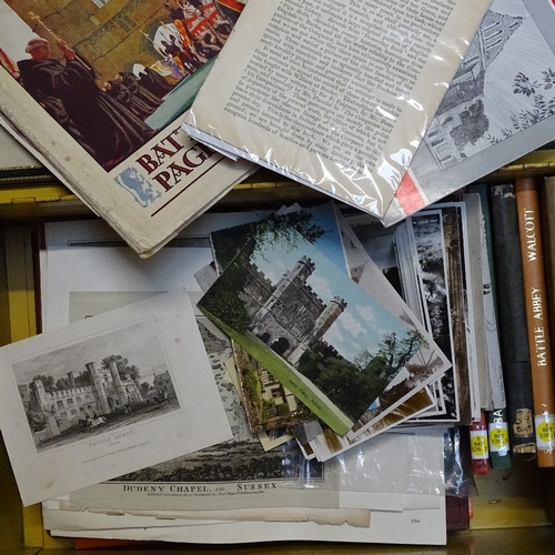 749 - A yellow tin trunk containing books about Battle Abbey, print etc