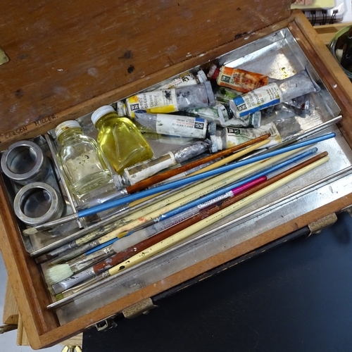 751 - Artist's easels, a case of acrylic paints, brushes, and another paints box