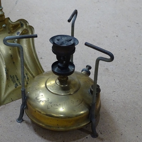 793 - An early 20th century brass fire companion set, and a Svea no. 106 Swedish brass gas stove