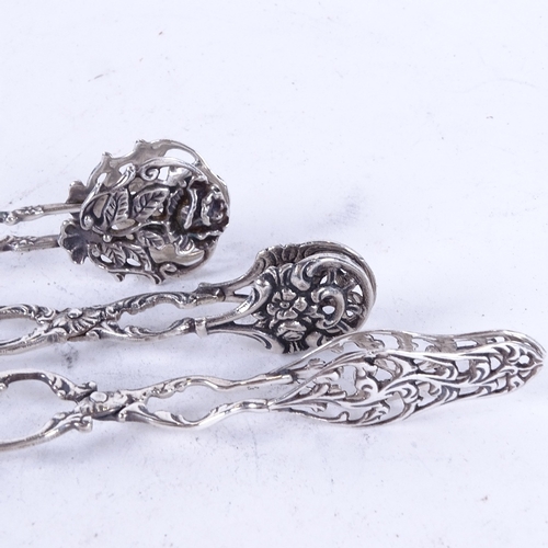 1112 - 3 pairs of decorative silver cake tongs, all stamped, and a Swedish silver spoon